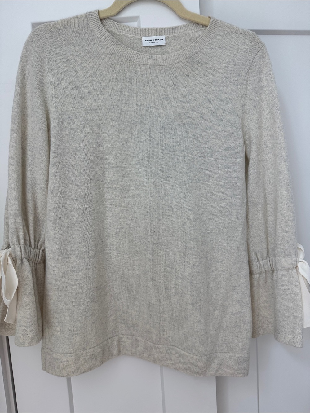 Club Monaco Light Cream Scoop Neck Cashmere Sweater with Ribbon Sleeve Ties